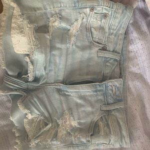 American eagle light wash shorts with rips